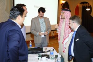 FinTech School instructors Amilcar Chavarria, Luigi Wewege and Edwin Carlson share a laugh with the Kuwait Finance House, Bahrain MD & CEO - Abdulhakeem Y. Al-Khayyat and Executive Manager - Paul Mercer.