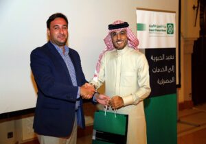 Luigi Wewege receiving a thank you gift from the Kuwait Finance House, Bahrain MD & CEO - Abdulhakeem Y. Al-Khayyat post his digital banking presentation in Manama at the Sheraton Bahrain Hotel.