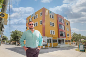 President of Caye International Bank, Luigi Wewege in front of the bank headquarters on San Pedro, Ambergris Caye in Belize, Central America